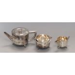 A three piece silver plated Walker and Hall tea set