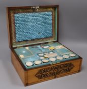 A 19th century marquetry sewing box with accessories