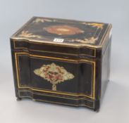 A lacquered, brass and tortoiseshell inlaid tantalus box, (lacking bottles and glasses)