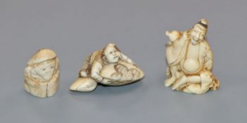 Three Japanese netsukes, two ivory and one bone