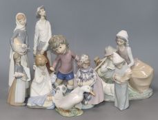 Nine Lladro figures