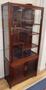 A Chinese rosewood cabinet W.84cm