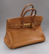 A Hermes tan leather Birkin handbag, with dust bag (puchased 1998 from Paris store) Width 35cm