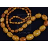 A single strand graduated oval amber bead necklace, gross weight 64 grams, 78cm.