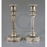 A pair of George IV silver candlesticks, Matthew Boulton, Birmingham 1825, with gadrooned borders