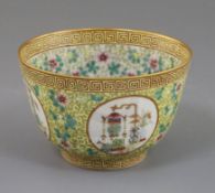 A Chinese yellow ground deep bowl, Tongzhi mark and possibly of the period, the exterior with