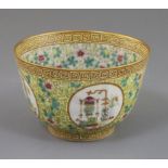 A Chinese yellow ground deep bowl, Tongzhi mark and possibly of the period, the exterior with