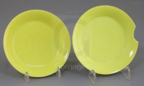 A fine pair of Chinese lemon yellow saucer dishes, Yongzheng mark and possibly of the period, each