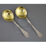 Two 18th century Scandinavian silver spoons, with gilded bowls and both terminals engraved with