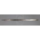 A fullered steel sword, decorated throughout with a Middle Eastern inscription length 37.5in.