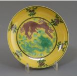 A Chinese yellow ground green and aubergine enamelled 'dragon' dish, Guangxu mark and possibly of