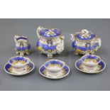 A Rockingham porcelain miniature tea set, c.1830-42, each piece painted with flower sprays within