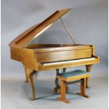 A Bluthner walnut cased boudoir grand piano, with shell carved cabriole legs and pad feet, W.4ft