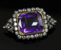 A Victorian gold and silver, amethyst and diamond set pendant brooch, of lozenge form, the emerald