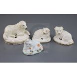 Three Rockingham porcelain figures of sheep, c.1830, all three gilt decorated, the largest