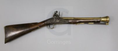 A late 18th / early 19th century Irish brass barrelled blunderbuss, with flintlock signed Edward?,