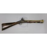 A late 18th / early 19th century Irish brass barrelled blunderbuss, with flintlock signed Edward?,