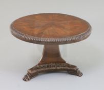 A George IV rosewood banded mahogany miniature breakfast table, with tilt top, triangular base and