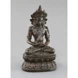 A Tibetan silver and gold inlaid copper alloy figure of Amitayus/Amitabha, c.15th century, seated in