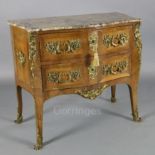 A Louis XV style ormolu mounted kingwood serpentine commode, with rouge marble top and two