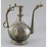 An 18th/19th century Mughal bronze and copper ewer, with stylised bird's head spout and handle, 11.