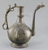 An 18th/19th century Mughal bronze and copper ewer, with stylised bird's head spout and handle, 11.