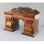 An early Victorian mahogany novelty tea caddy in the form of a twin pedestal sideboard, with three