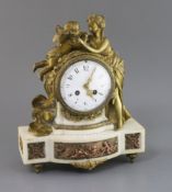 A 19th century French ormolu, white marble and copper eight day mantel clock, surmounted with