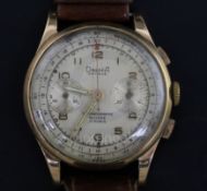 A gentleman's Dreffa Geneve 18ct gold manual wind chronograph wrist watch, with silvered dial, on