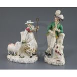 A pair of Rockingham porcelain groups of a shepherd and shepherdess, c.1830, each standing by a tree