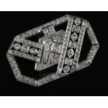 A 1950's/1960's Art Deco style platinum? and diamond set openwork brooch, of rectangular form with