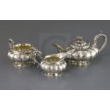 A George IV silver three-piece melon-shaped tea service, London 1827, Rebecca Eames & Edward Barnard