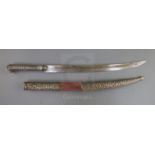 A 19th century Indian silver mounted dagger, with inscribed damascened steel blade, the hilt and