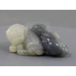 A Chinese grey and white jade lion-dog group, the carver skilfully using the grey inclusion in the