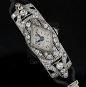 A lady's 1930's/1940's platinum? and diamond set cocktail watch, with diamond shaped Arabic dial, on