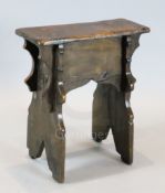 An early 17th century boarded oak stool, 1ft 7.5in. x 8.5in. H.1ft 10.5in.