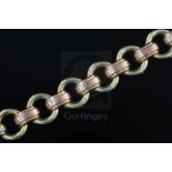 A mid 20th century Hungarian 14ct two colour gold circular link bracelet, 19cm.