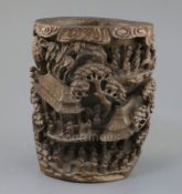 A Chinese bamboo rootwood brushpot, 18th/19th century, carved in high relief and openwork with 75