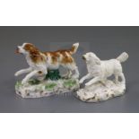 A Rockingham porcelain figure of a springer spaniel, c.1830 and a Samson copy, the gilt and white