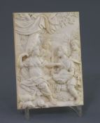 An 18th century Continental relief carved ivory plaque, depicting huntsmen presenting a boar's