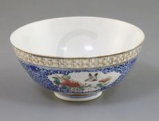A Chinese famille rose bowl, late 19th century/early 20th century, painted to shaped reserves with