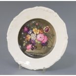 A Rockingham porcelain cabinet plate, c.1830-42, attributed to Edwin Steele, painted with a basket