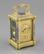 An early 20th century French ormolu and champleve enamel repeating carriage clock with alarm, with