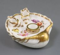 A Rockingham porcelain 'shell' inkwell, c.1826-30, painted with flower sprays, with two shell-shaped