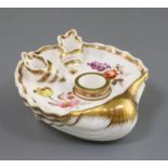 A Rockingham porcelain 'shell' inkwell, c.1826-30, painted with flower sprays, with two shell-shaped