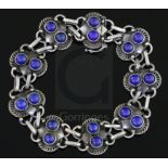 A Danish Georg Jensen sterling silver and lapis lazuli set bracelet, no.8, post 1945 mark, the