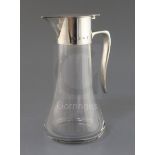 A silver-mounted glass claret jug of tapered form, Birmingham 1972, maker Robert Welch, 25cm.