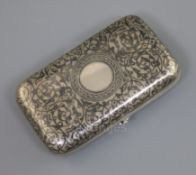 A late 19th century Russian 84 zolotnik silver and niello cigarette case, of rounded rectangular