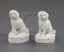 Two Rockingham porcelain figures of poodles, c.1830, both incised to the base, 'No. 97', one