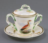 A rare Rockingham porcelain ornithological cup, cover and stand, c.1826-30, applied with entwined